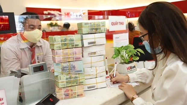 Monetary stance points to only mildly higher interest rates in VN: Fitch Ratings